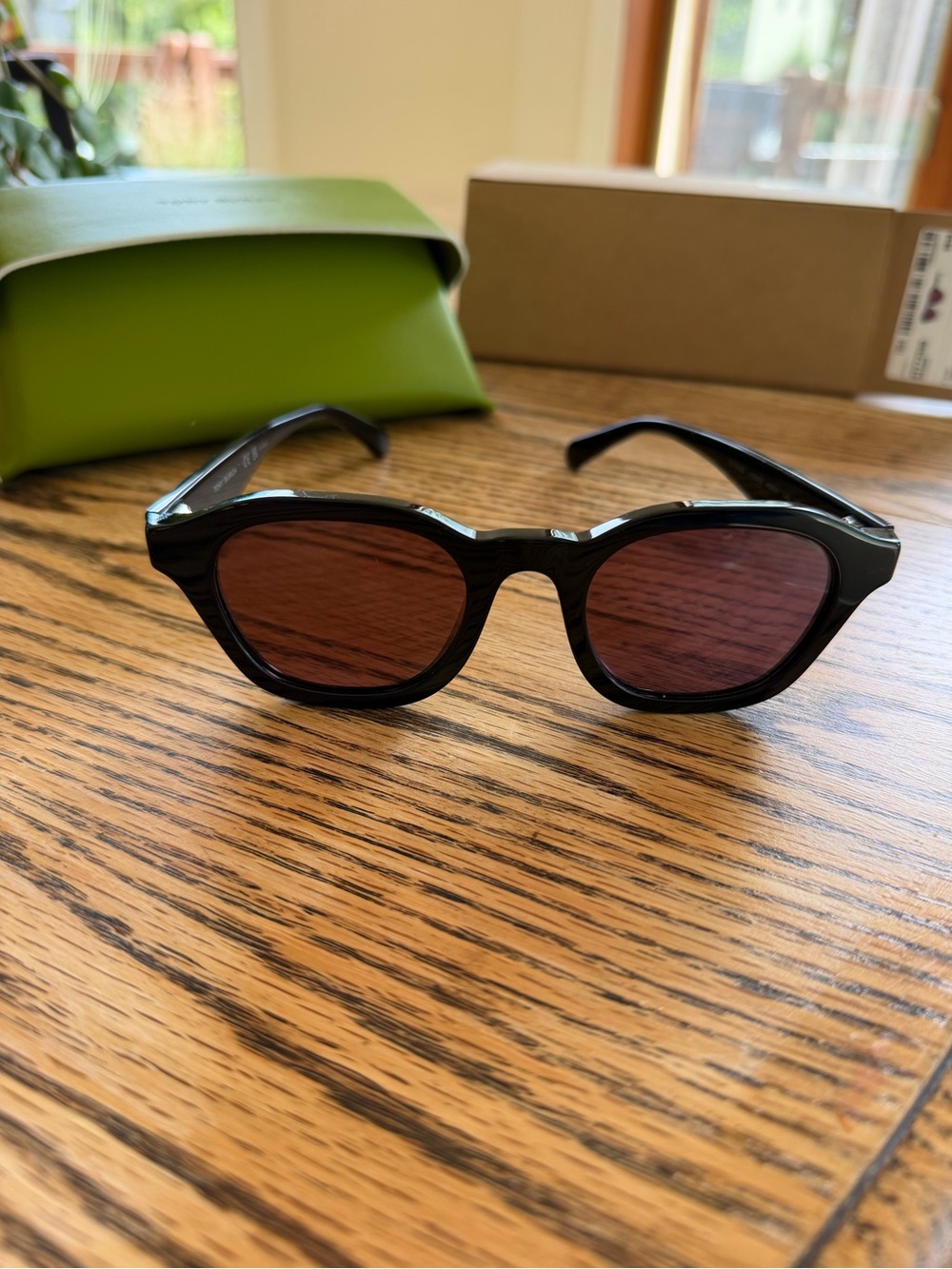 Tory Burch Black Frame Sunglasses with Violet Polarized Lenses
